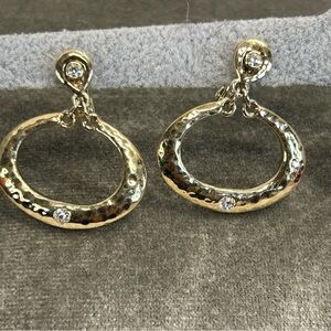 Monet hammered gold tone oval crystal rhinestone dangling clip on earrings